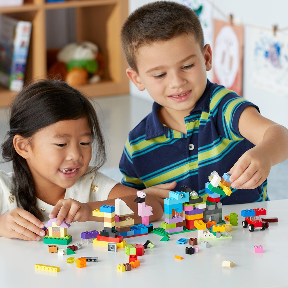 Kids building with legos