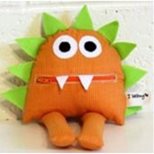 A pillow shaped like a monster