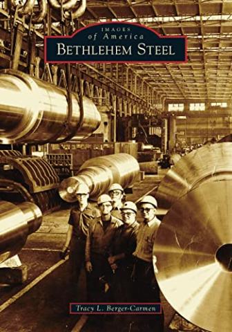 Black and white photo of Bethlehem Steel workers inside of a warehouse