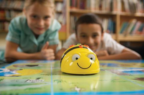 Kids playing with Beebot