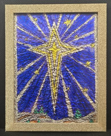 A gold and silver star on a blue background