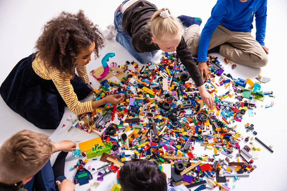 Kids playing with LEGOs