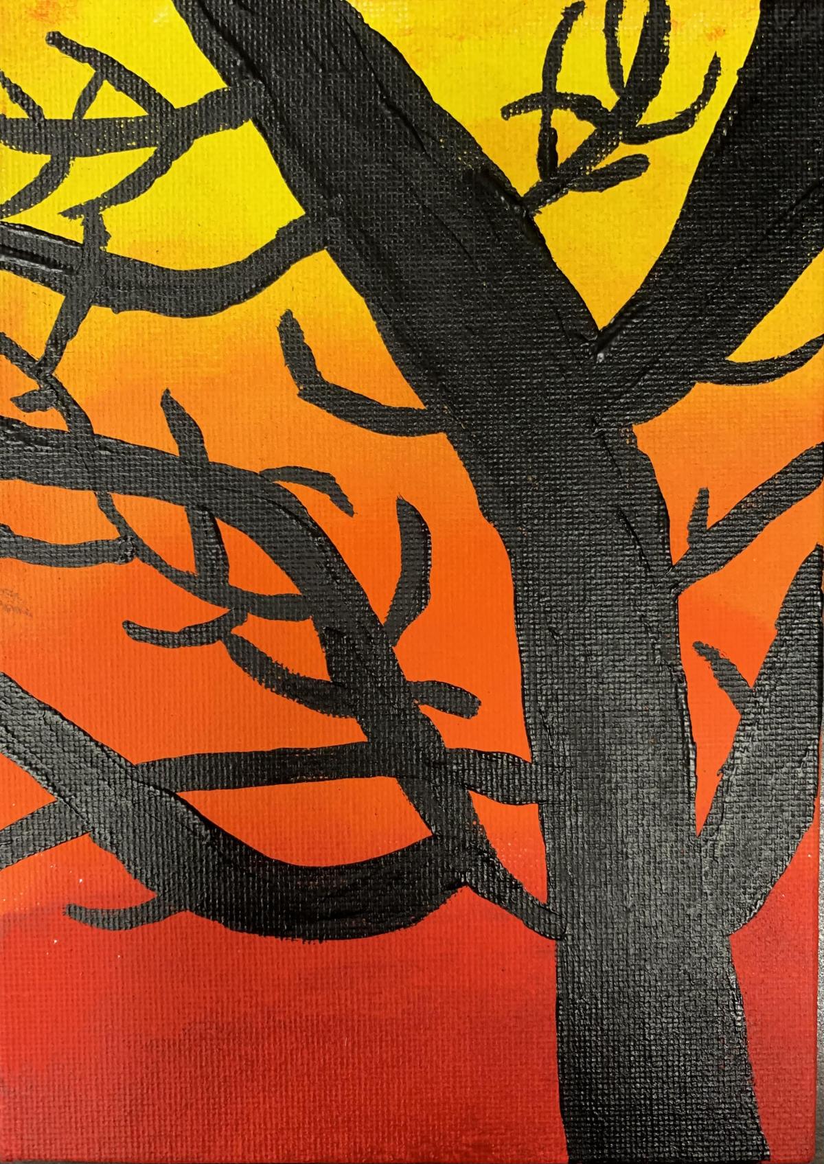 A black tree painted overtop a blend of yellow, orange, and red